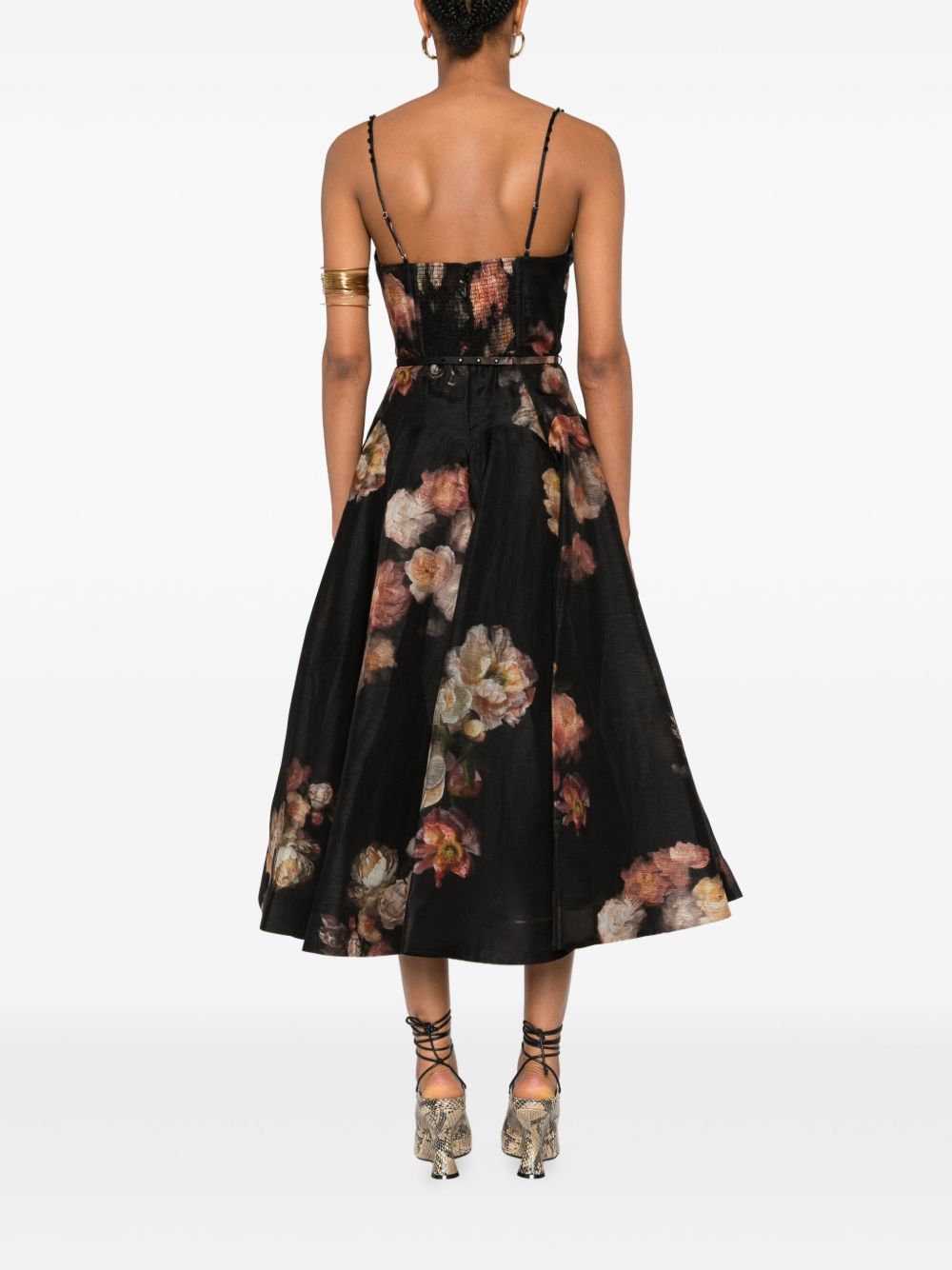 Black floral dress worn by a model on a white background