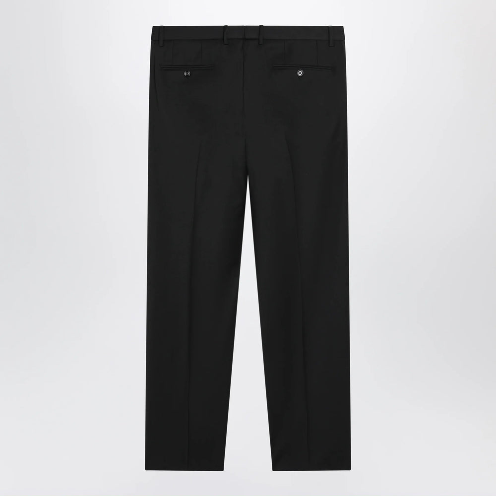 Dolce&Gabbana - Tapered pleated wool-blend trousers in black Brand Apparel & Accessories > Clothing > Pants 50 IT